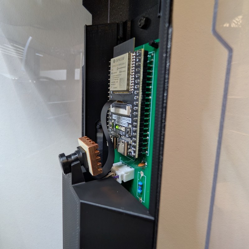 Camera connected and seated onto lower cover camera support.jpg