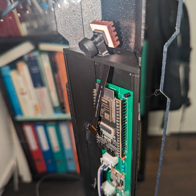 Camera seated atop the electronics holder.jpg